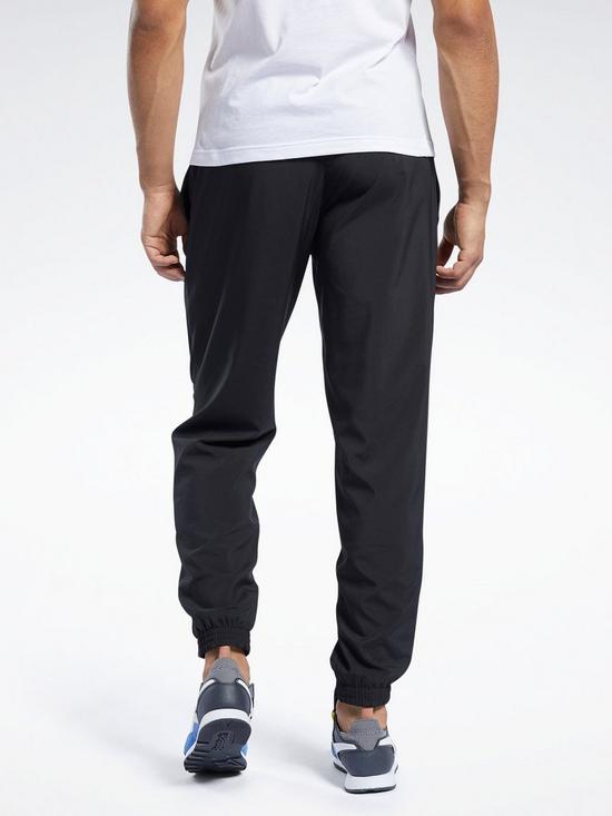 stillFront image of reebok-training-essentials-woven-cuffed-pants-black