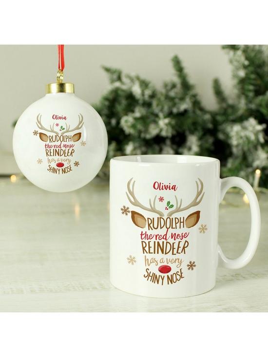 stillFront image of the-personalised-memento-company-rudolph-the-red-nosed-reindeer-mug-bauble-set