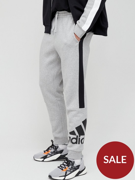 front image of adidas-essentials-colourblock-pants-greyblack
