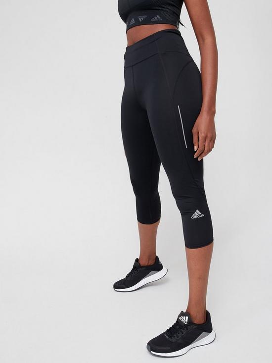 front image of adidas-own-the-response-running-womens-capri-34-leggings-black