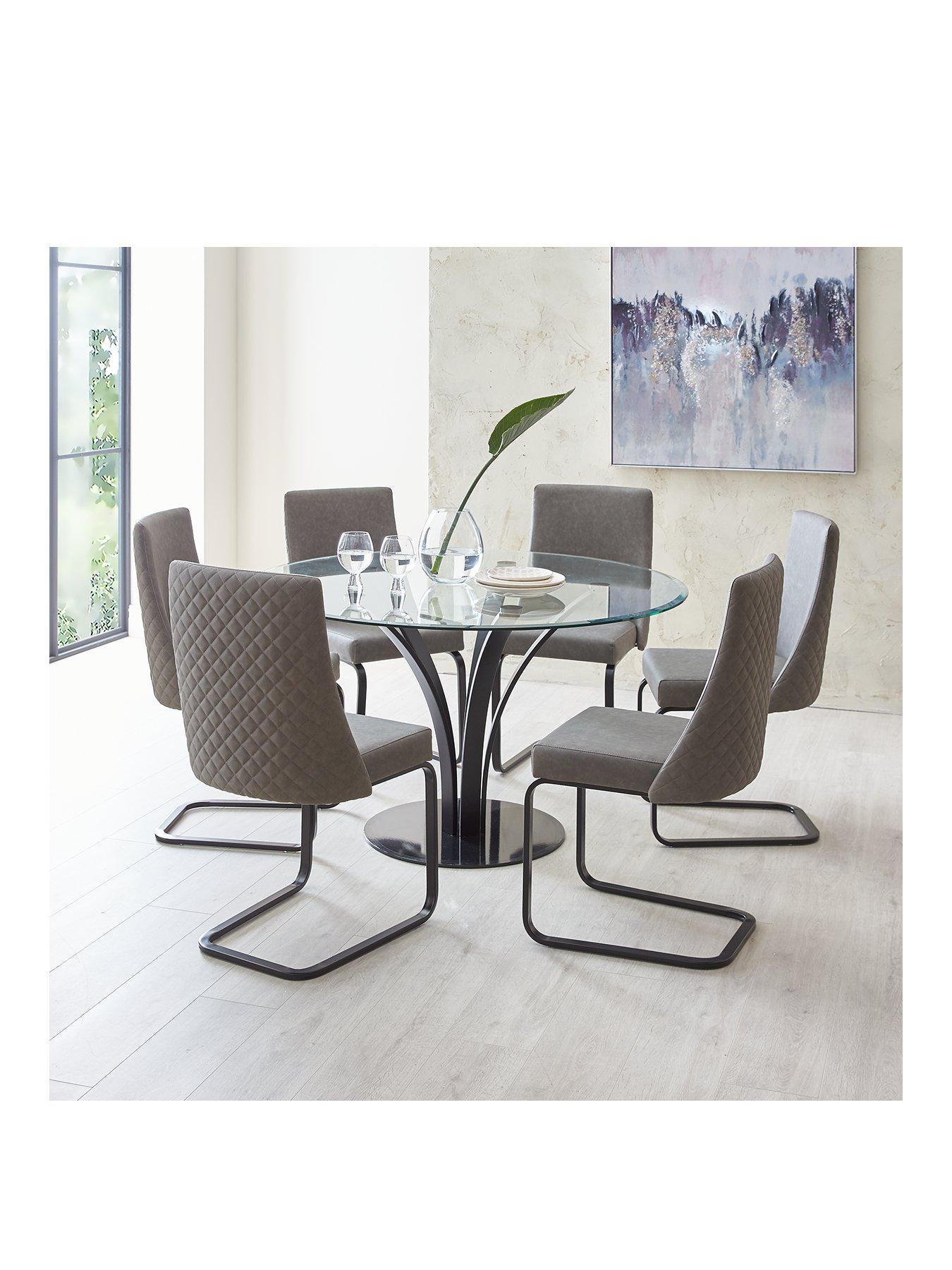  image of alanna-130-cm-glass-top-round-dining-table-6-chairs-charcoal
