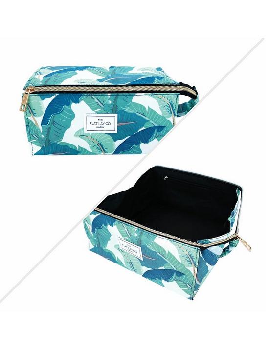 front image of the-flat-lay-co-tropical-leaves-open-flat-makeup-box