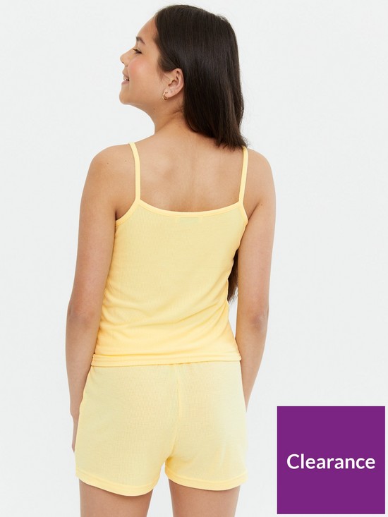 stillFront image of new-look-915-girlsnbsphello-sunshine-logo-short-pyjama-set-pale-yellownbsp