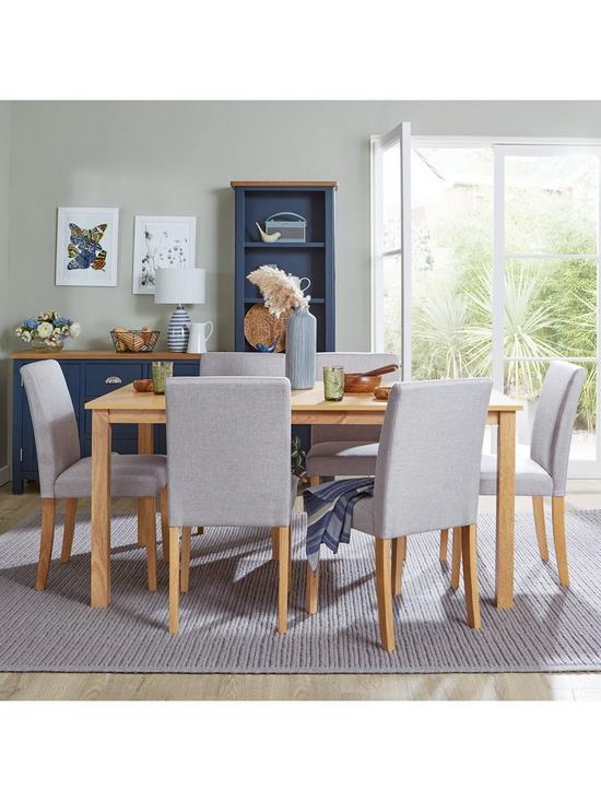 front image of primo-150-cm-dining-table-6-fabric-chairs