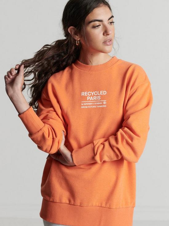 front image of superdry-studios-100-recycled-sweat-orange