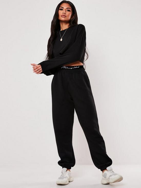 front image of missguided-script-tape-joggers-black