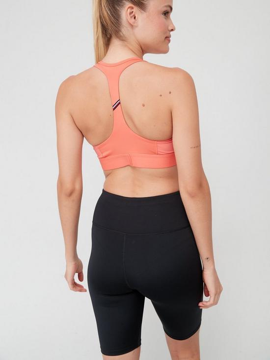 stillFront image of tommy-sport-performance-mid-intensity-graphic-racer-bra-coral