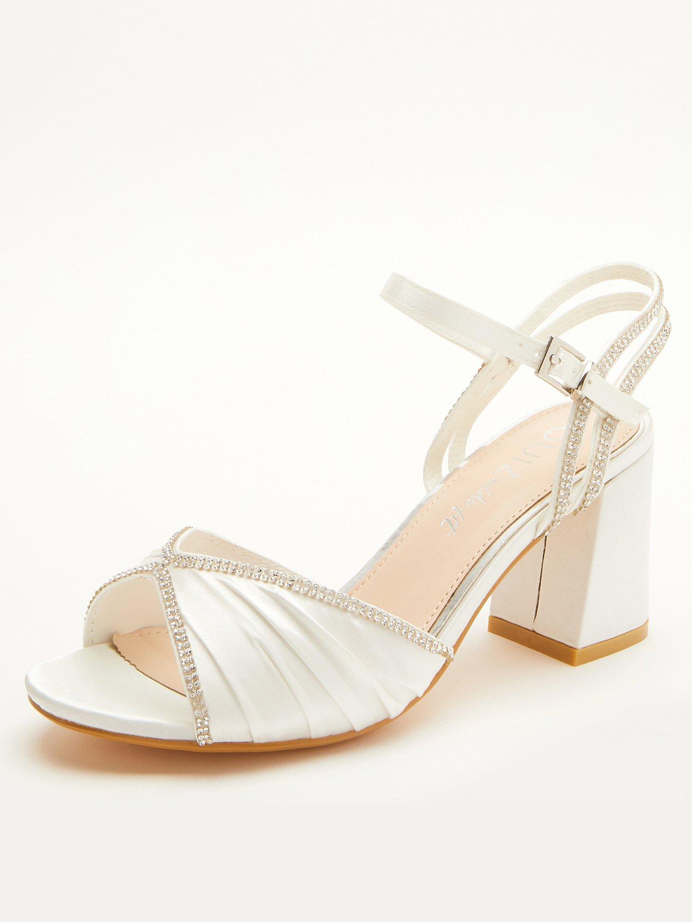 white heeled flip flops