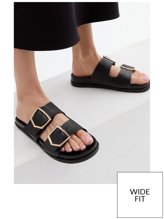 stillFront image of new-look-wide-fit-black-leather-look-buckle-footbed-sliders