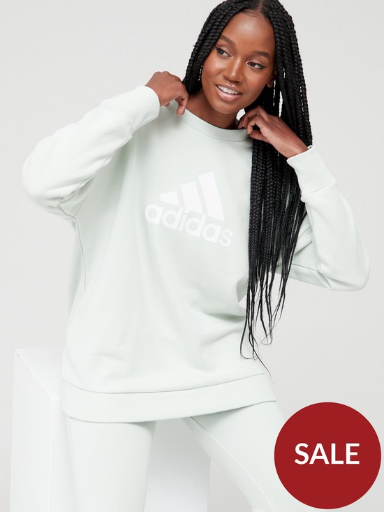 front image of adidas-future-icons-badge-of-sport-crew-sweat-top-light-green