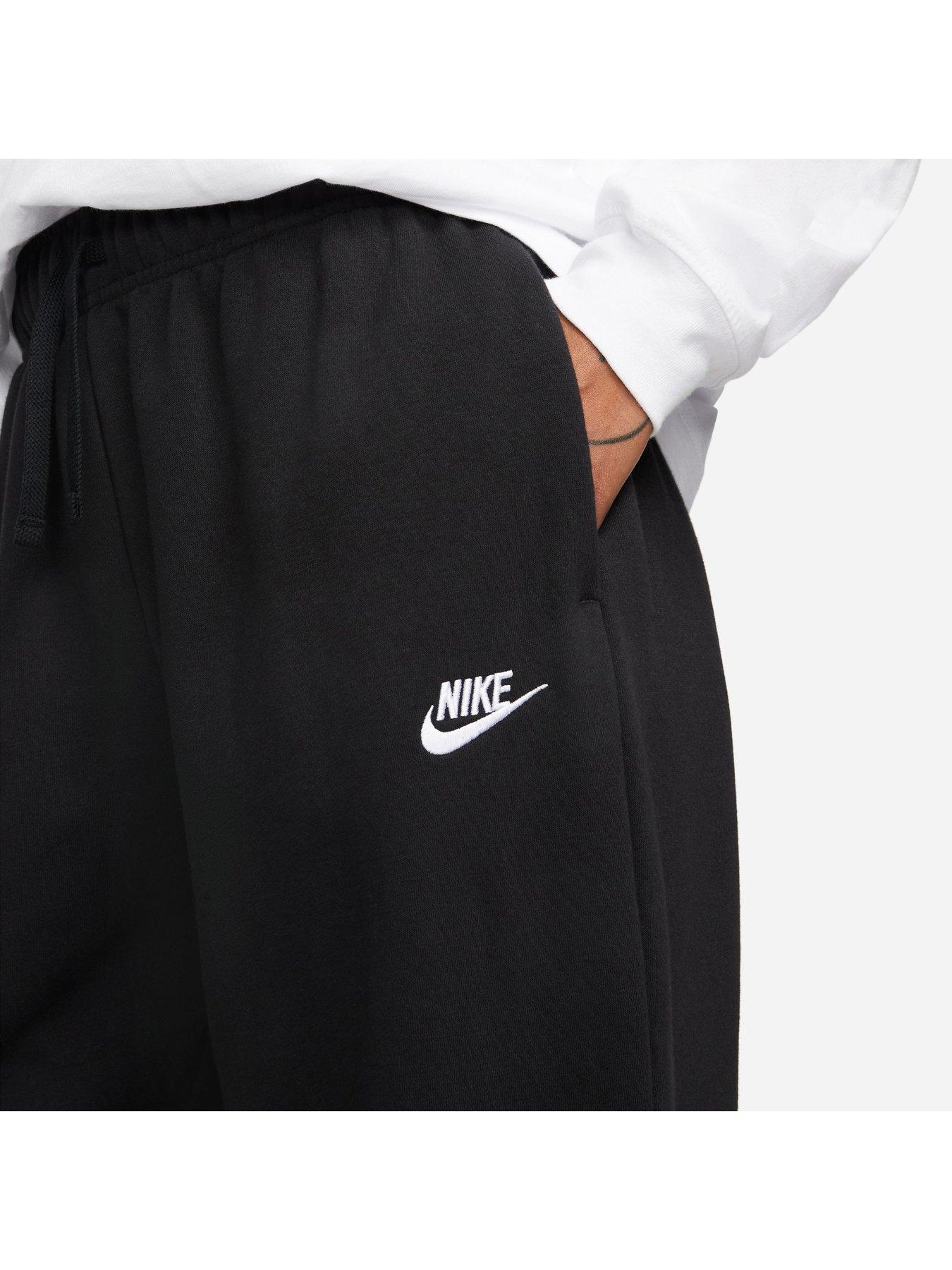 Nike Plus mini swoosh oversized jogger in black
