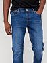  image of jack-jones-mike-regular-tapered-fit-jeans-mid-wash
