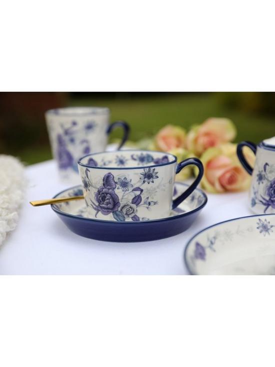 stillFront image of london-pottery-blue-rose-teacup-and-saucer