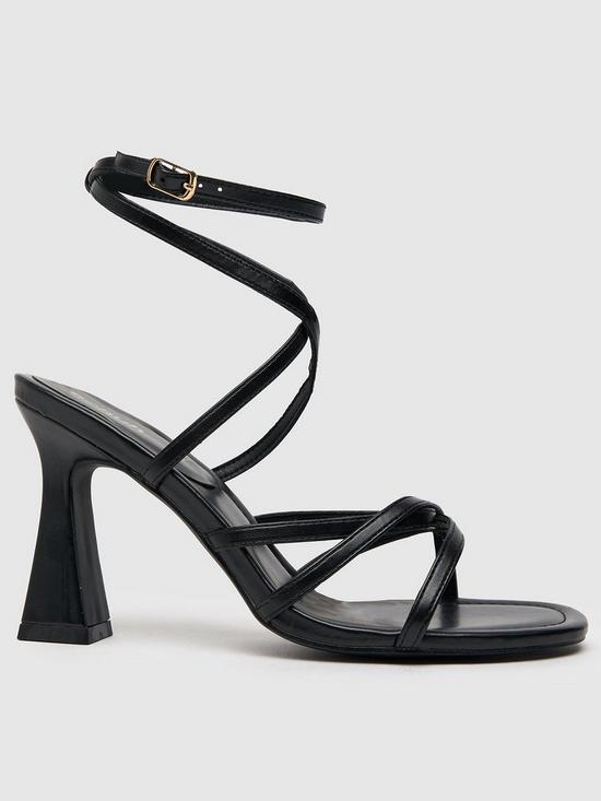 front image of schuh-serene-croc-flared-heel-sandal-black