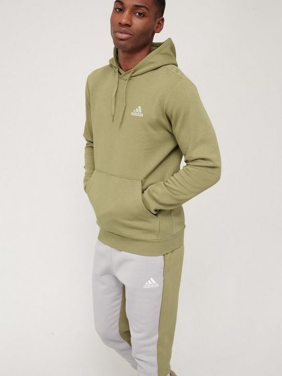 front image of adidas-feelcozy-hoodie-greenwhite
