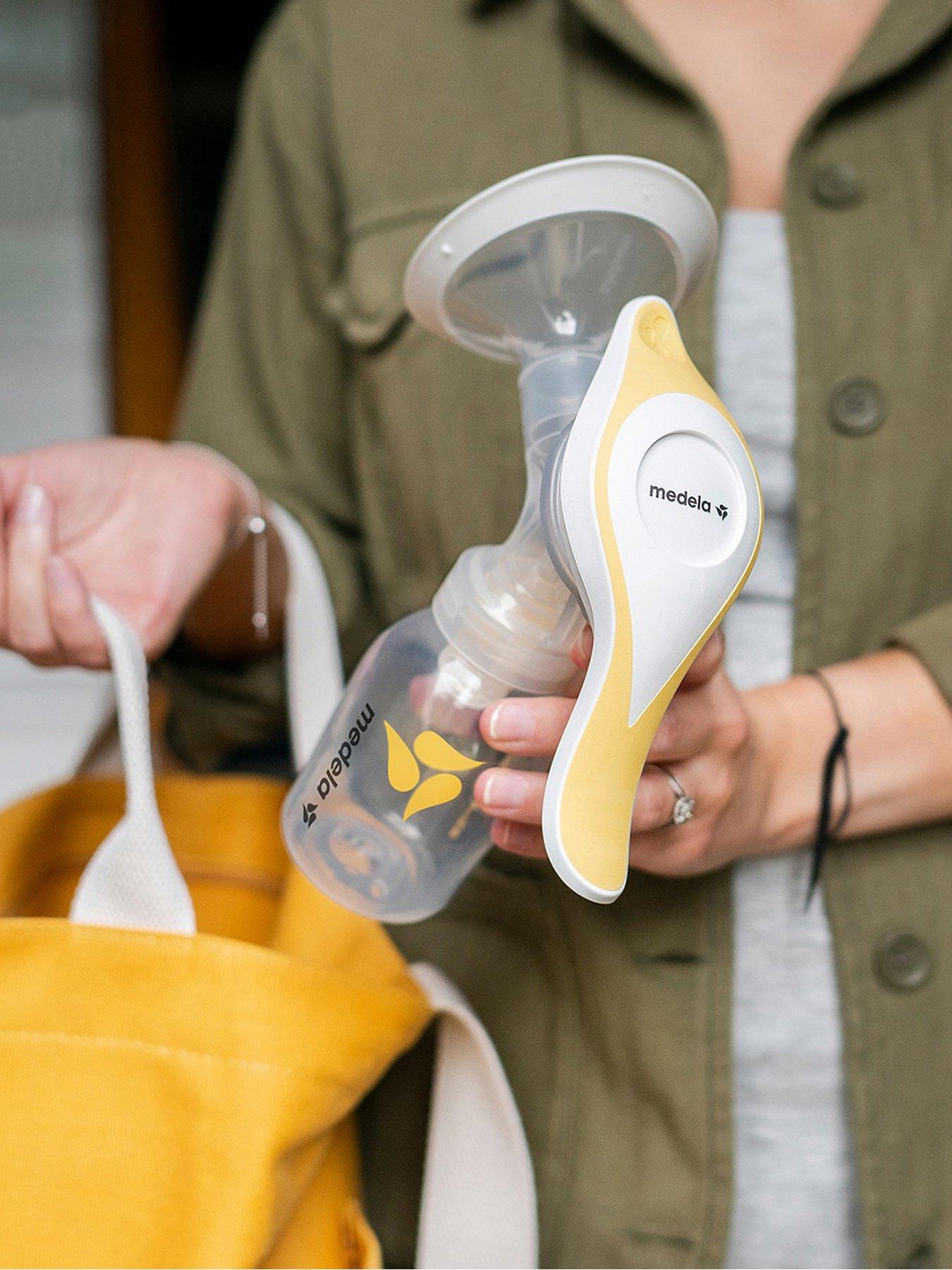 Image 1 of 5 of Medela Harmony Flex Manual Breast Pump - Yellow