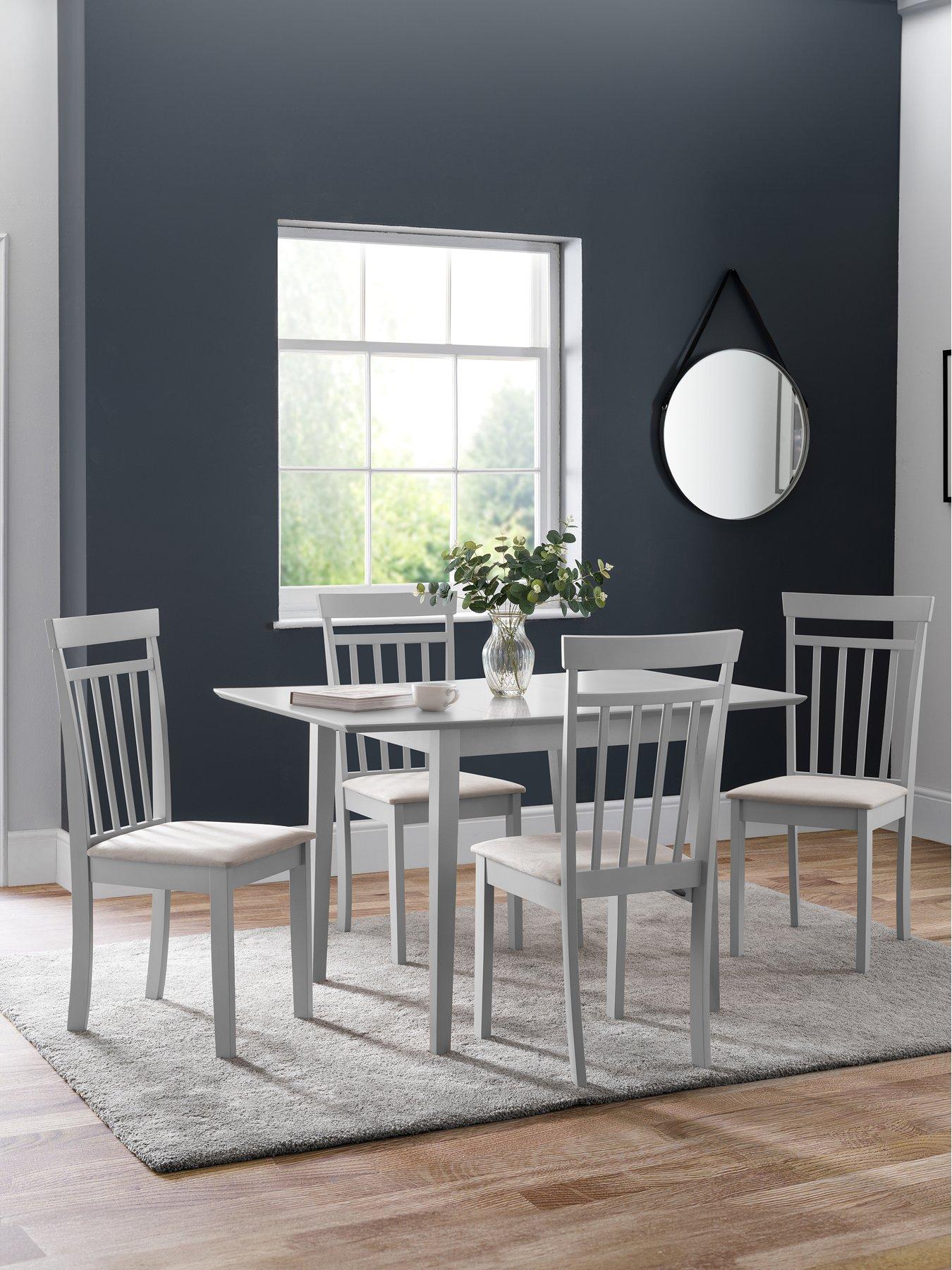 Littlewoods table and outlet chairs