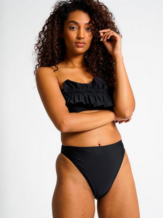 front image of south-beach-black-frill-bandeau-with-clasp-back-and-hi-leg-brief