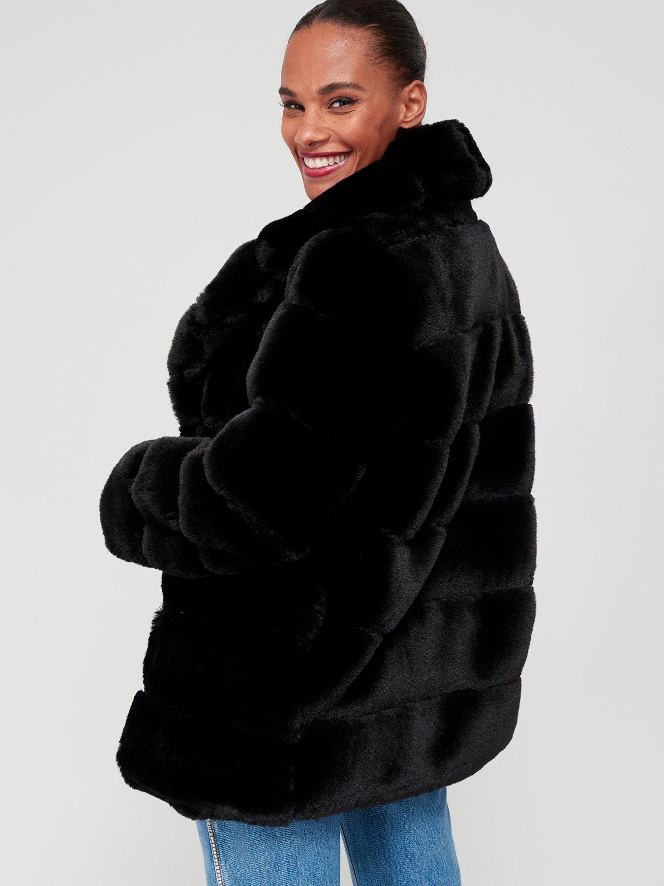 Black carved on sale faux fur coat
