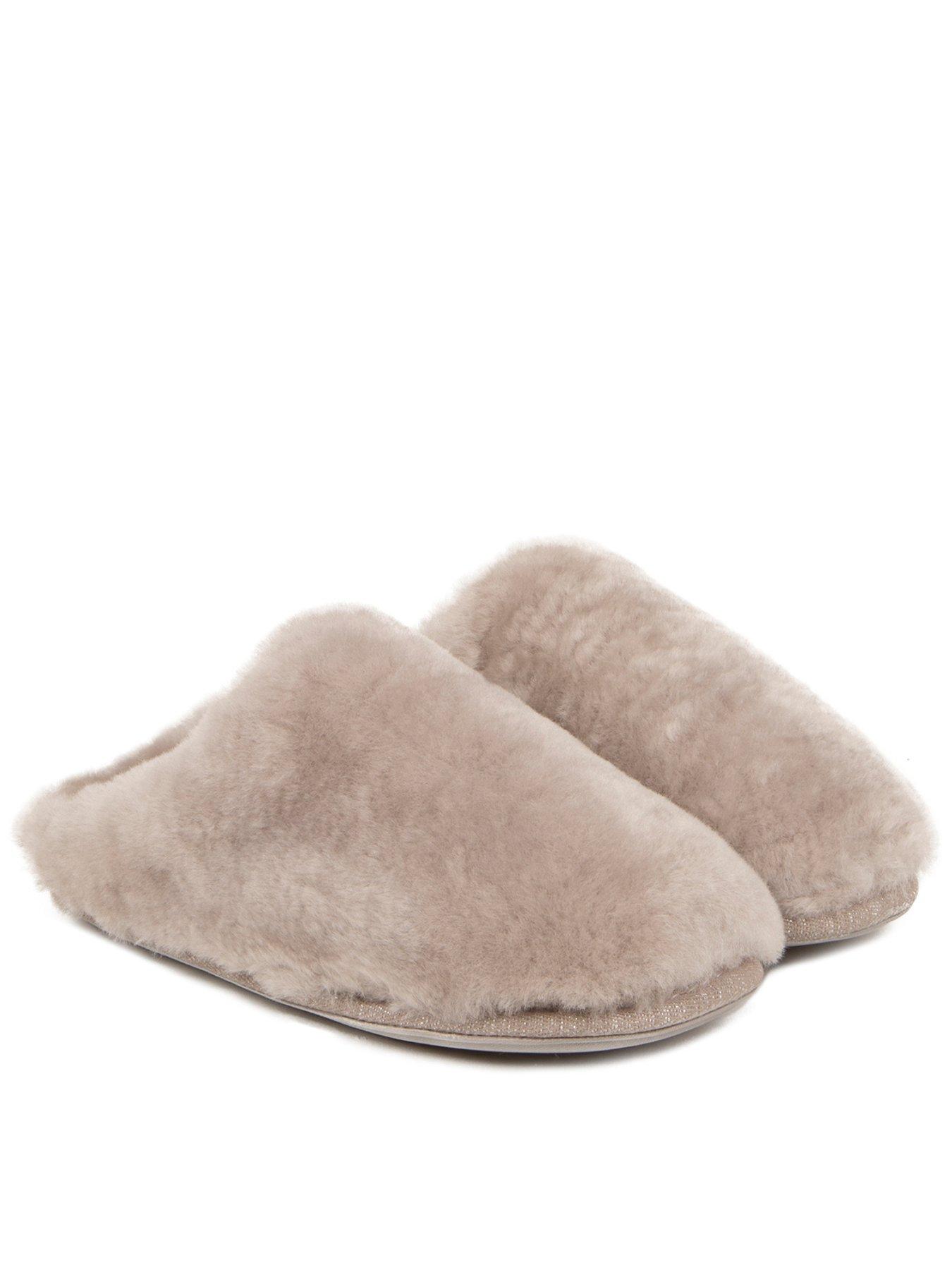 undefined Full Sheepskin Sweptback Mule.