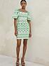  image of never-fully-dressed-green-broderie-mini-dress