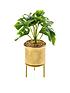  image of hestia-gold-footed-planter-with-faux-plant