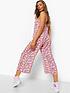  image of boohoo-floral-strappy-culotte-jumpsuit-white