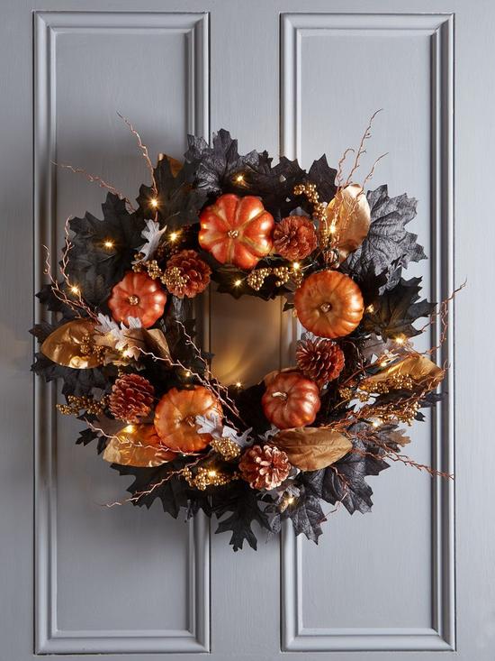 front image of very-home-autumnnbsppre-lit-black-leaf-wreath-with-pumpkins