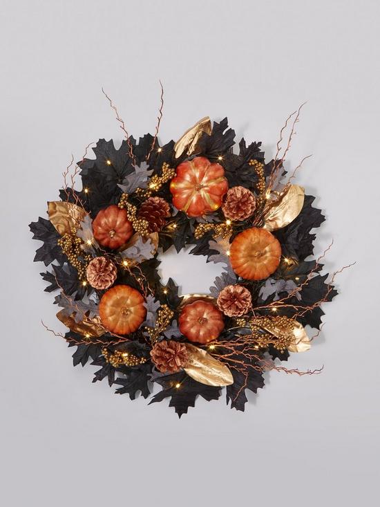 stillFront image of very-home-autumnnbsppre-lit-black-leaf-wreath-with-pumpkins