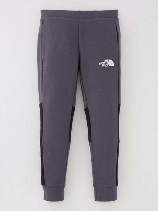 front image of the-north-face-teen-slacker-joggers-dark-grey