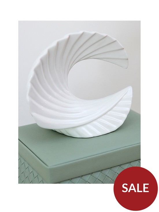 front image of chapter-b-decorative-seashell-ornament