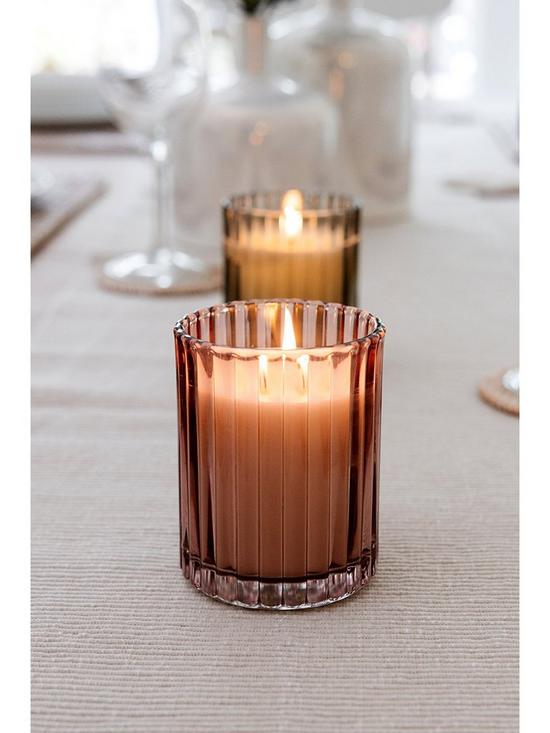 stillFront image of chapter-b-ribbed-glass-candle-pink