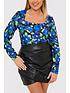  image of in-the-style-terrie-mcevoy-wrap-pu-skirt-black