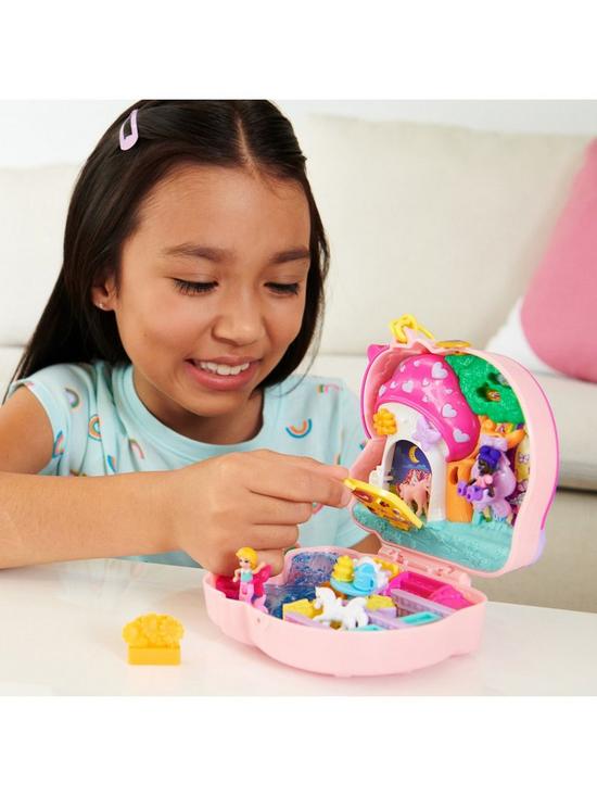 back image of polly-pocket-unicorn-forest-compact-and-accessories