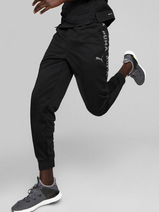 front image of puma-train-fit-pwrfleece-jogger-black