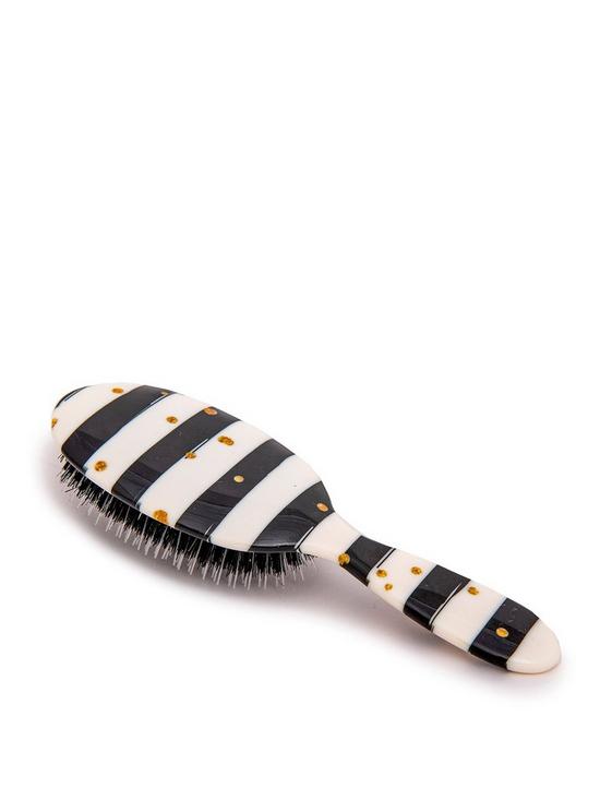 front image of rock-ruddle-black-white-stripes-small-mixed-bristle-brush