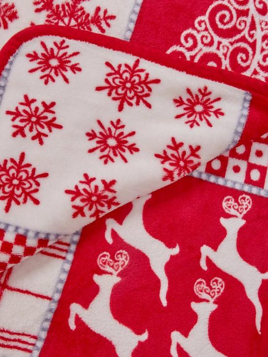 back image of cascade-home-winter-christmas-patchwork-throw-in-red