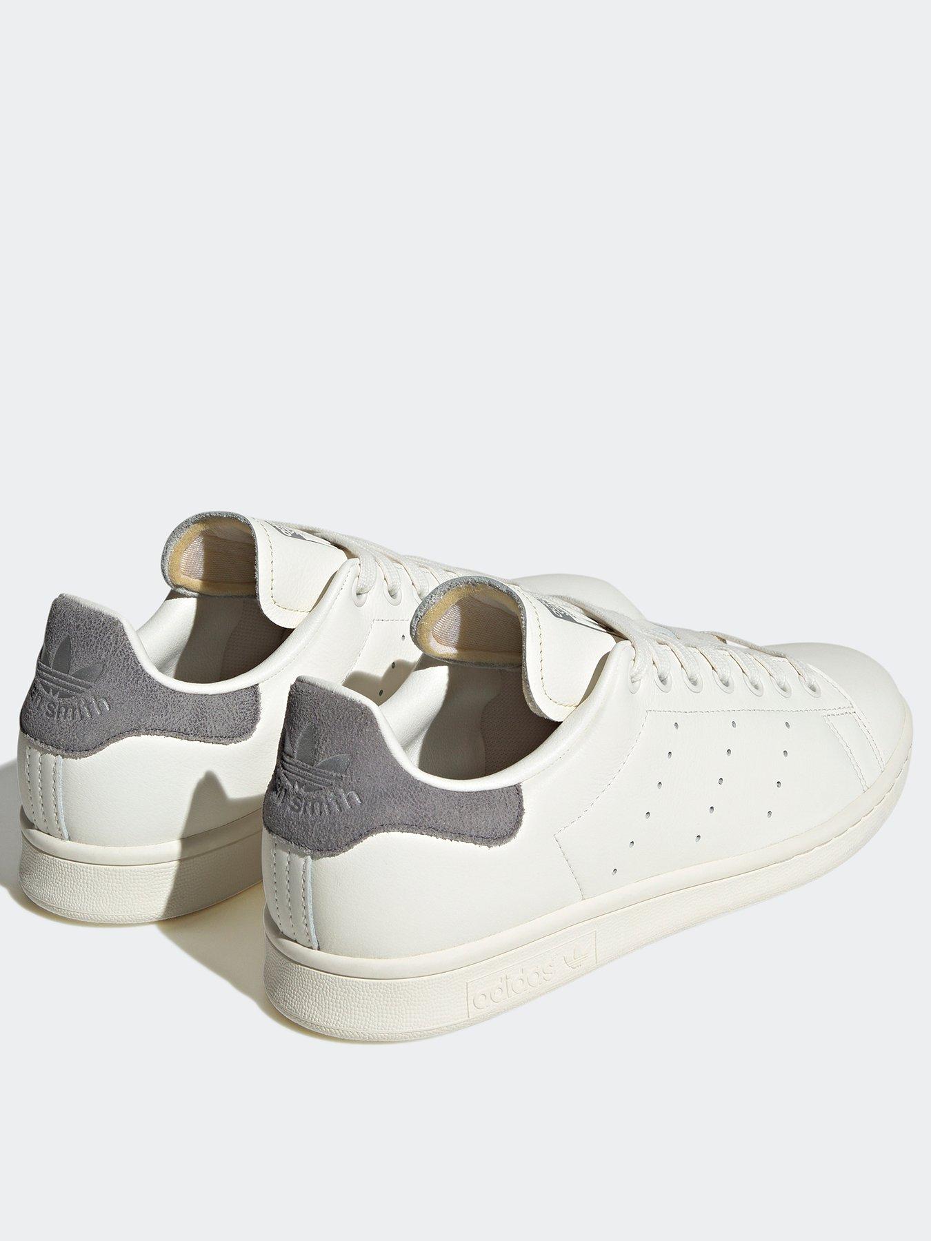 adidas Originals Stan Smith trainers in white/gold