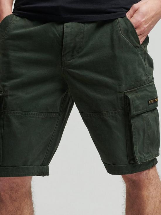 front image of superdry-vintage-core-cargo-shorts-olive