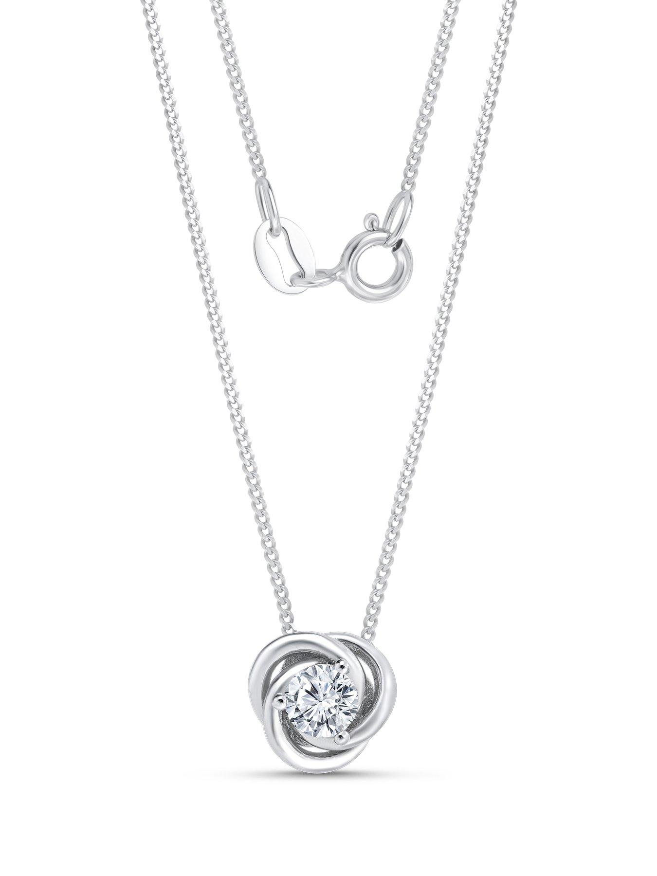  image of the-love-silver-collection-sterling-silver-cubic-zirconia-10mm-knot-pendant-and-8mm-earring-set