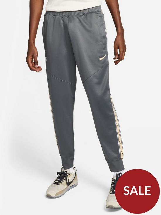 front image of nike-nswnbsprepeat-poly-knit-double-crest-zip-joggers-grey