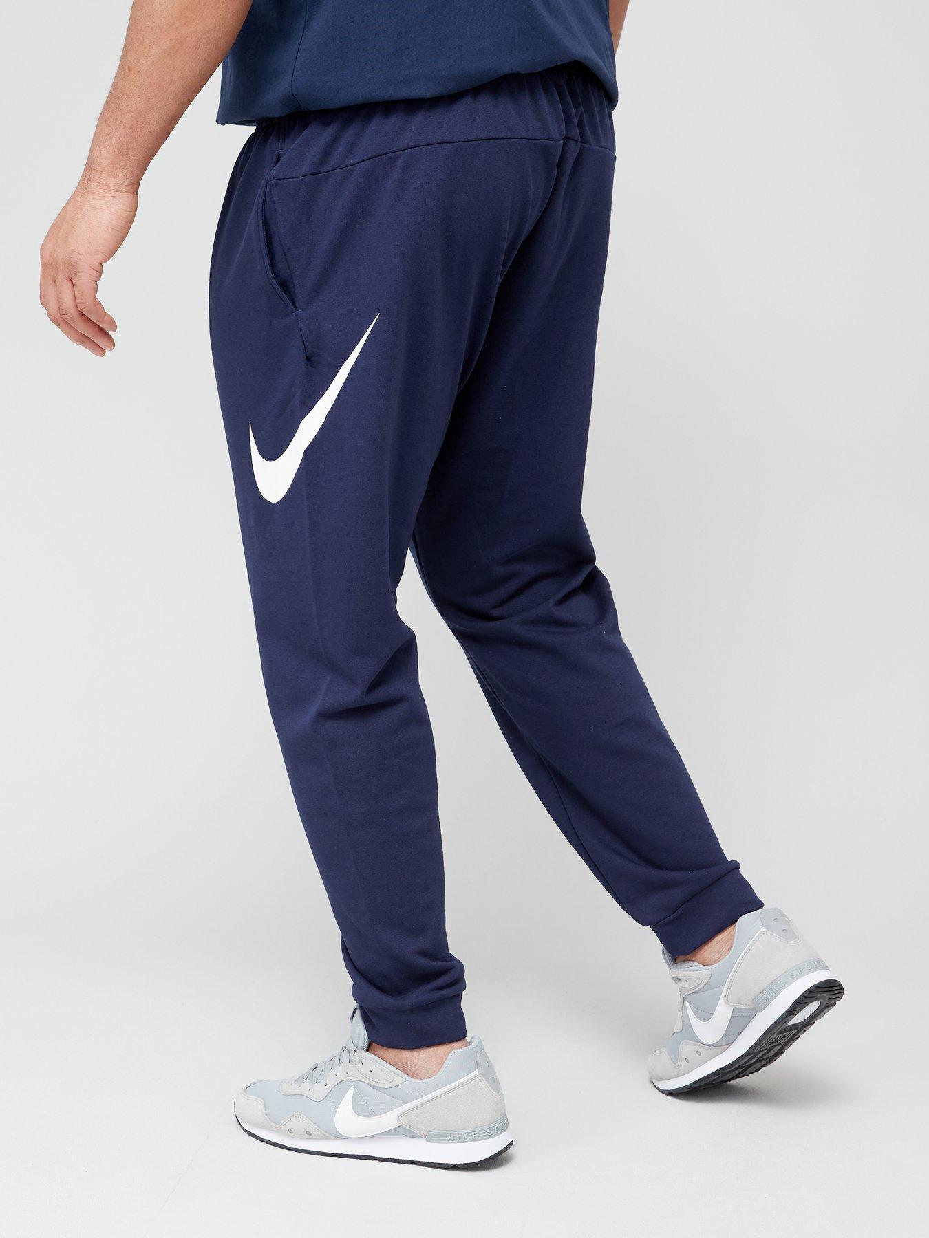 stillFront image of nike-trainnbspdry-fit-taper-swoosh-pants-navy-plus-size