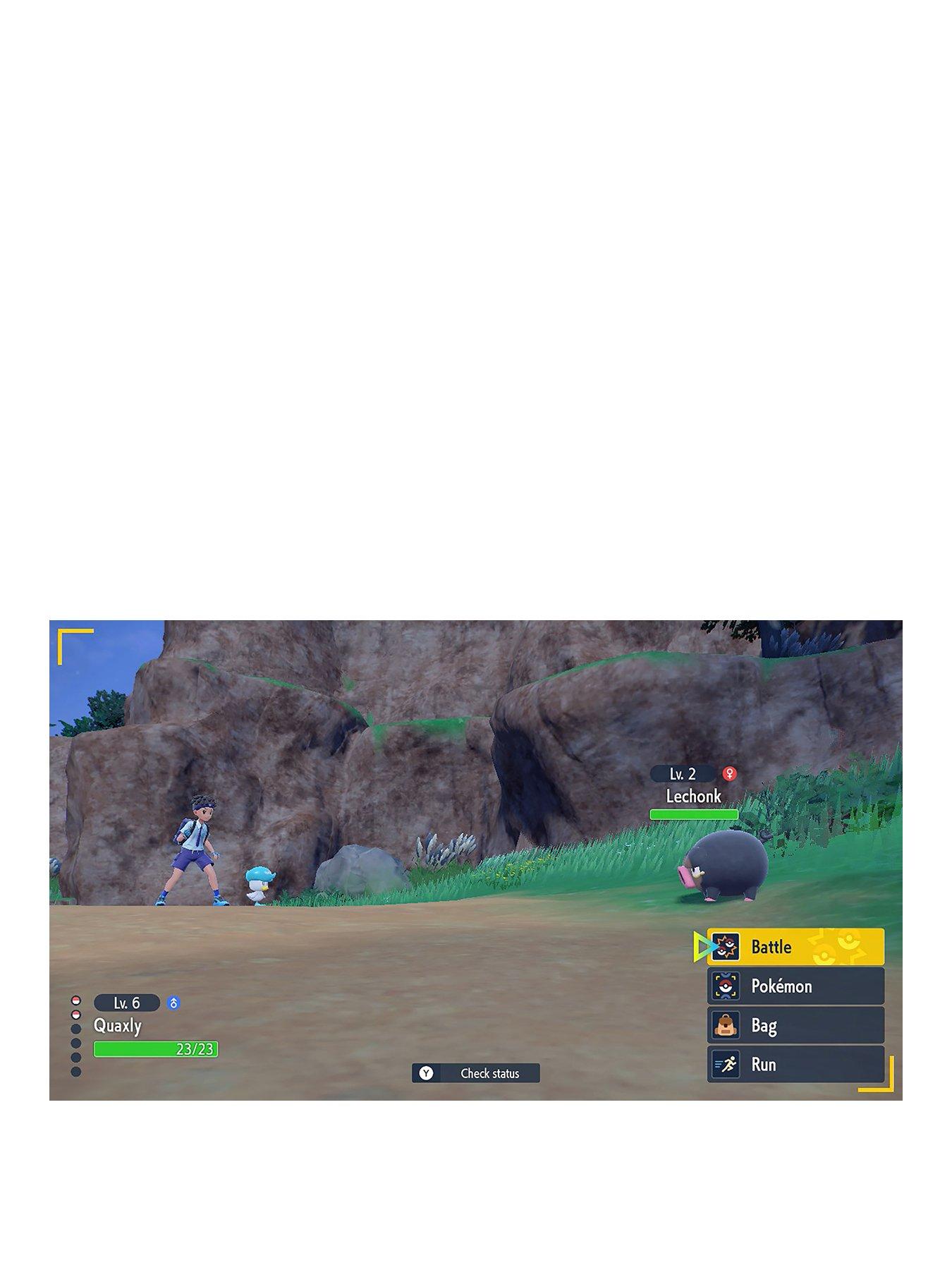 Image 2 of 8 of Nintendo Switch OLED White Console with Pokemon Scarlet &amp; Pokemon Violet