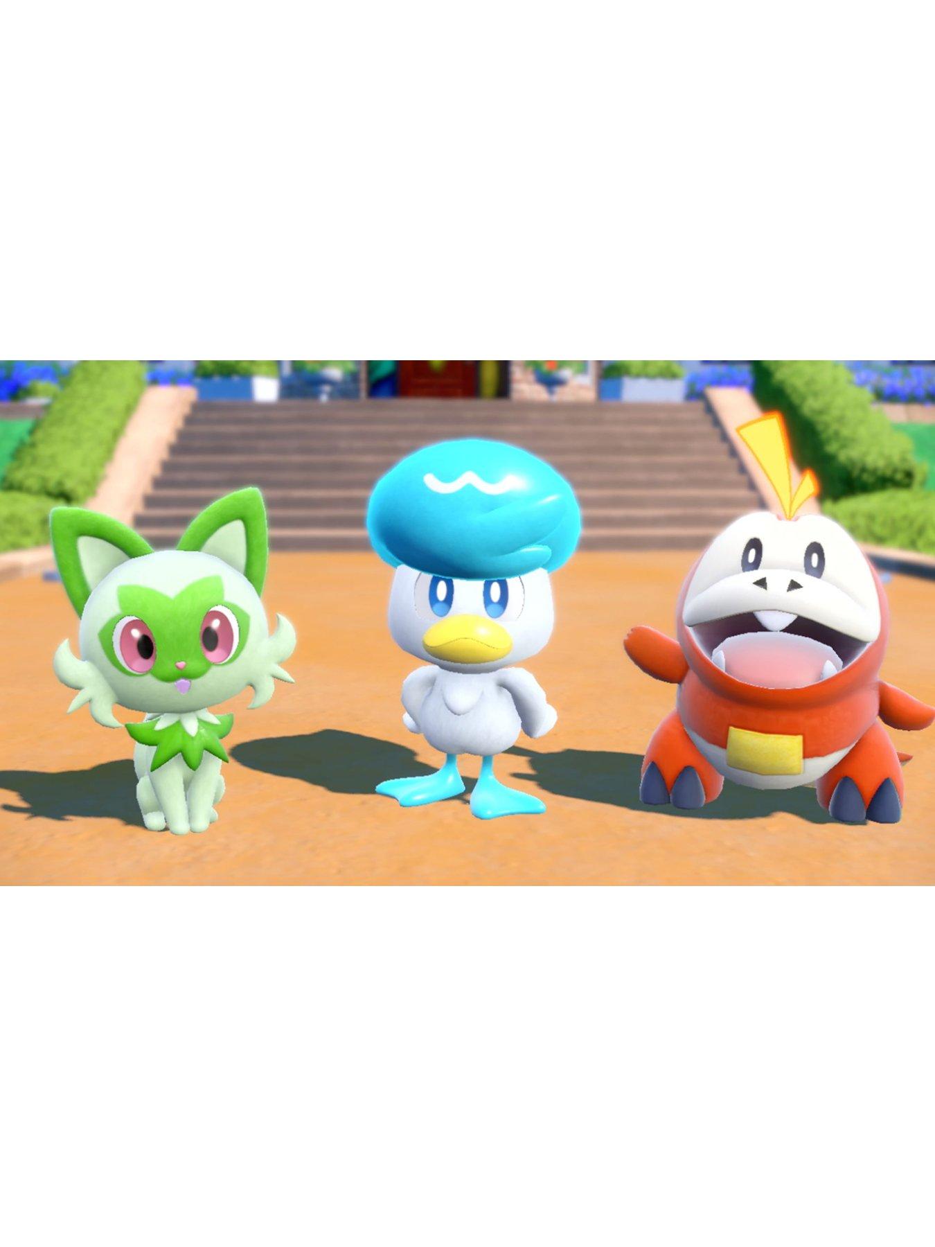 Image 6 of 8 of Nintendo Switch OLED White Console with Pokemon Scarlet &amp; Pokemon Violet