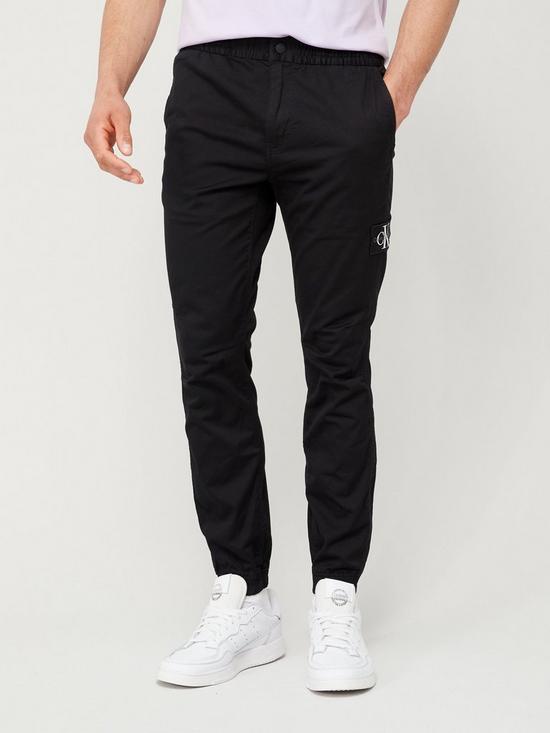 front image of calvin-klein-jeans-monologo-badge-casual-chinos-black