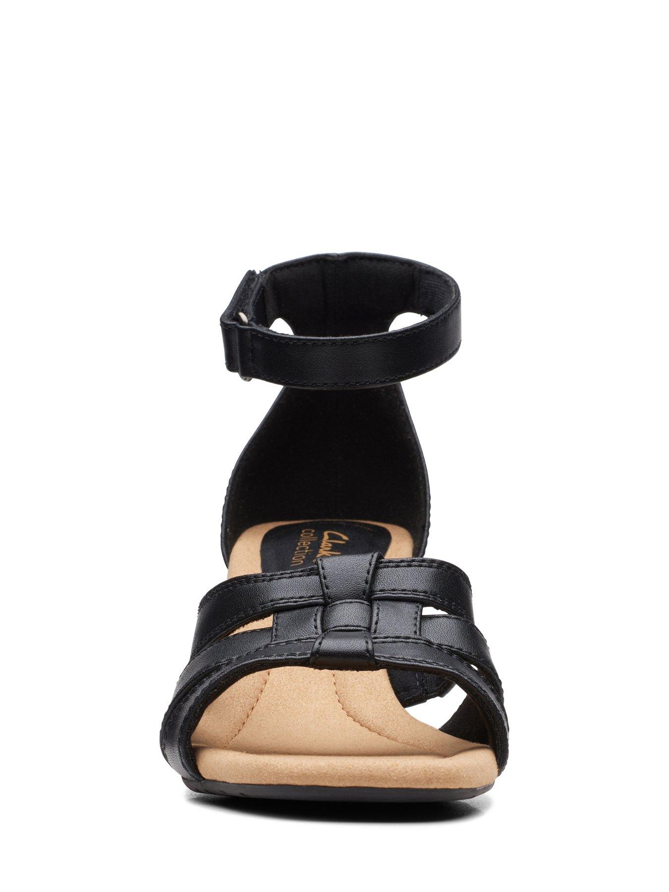  image of clarks-kyarra-joy-wide-fit-wedges-black-leather
