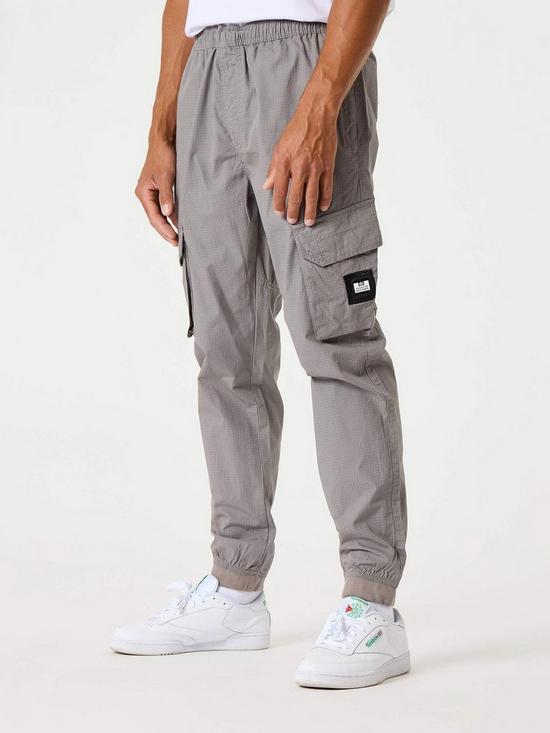 front image of weekend-offender-pianamo-cargo-pant-drizzle-grey