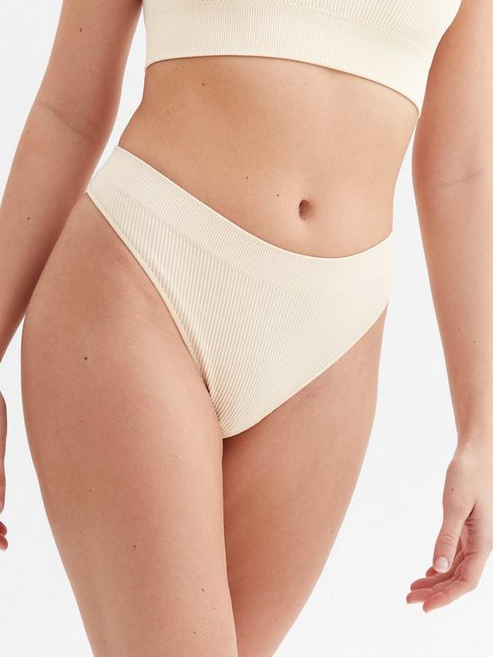 front image of new-look-nude-pearl-ribbed-seamless-thong