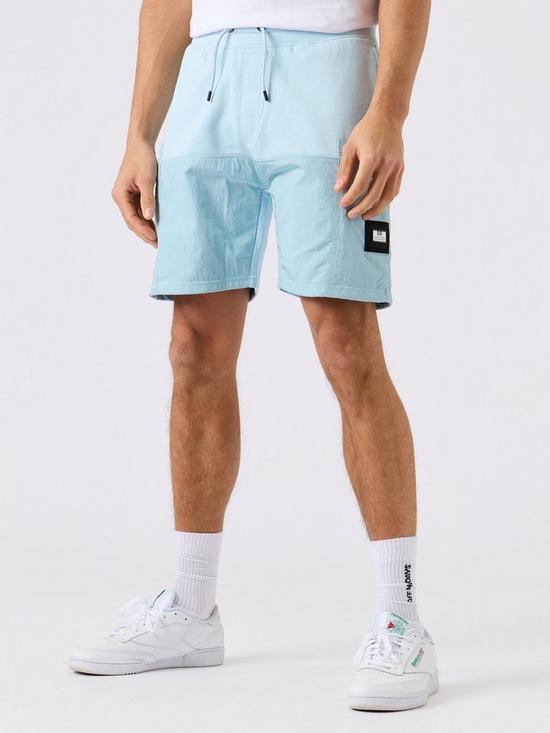 front image of weekend-offender-azeez-shorts-light-blue