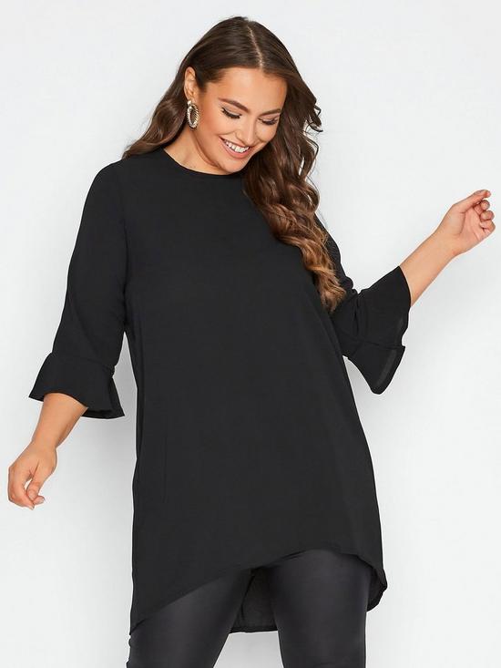 front image of yours-curve-flute-sleeve-tunic-black